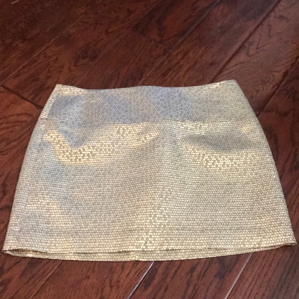 Express gold miniskirt.